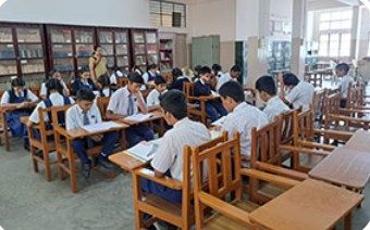 The school library with shelves of books
